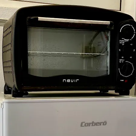 Cozy And Sunny Over The Rooftops *