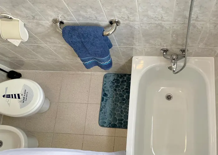 Cozy And Sunny Over The Rooftops *